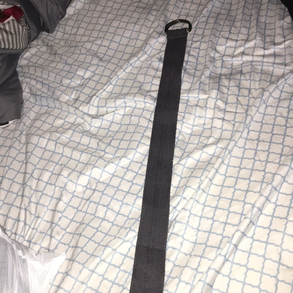 A gray adjustable belt.